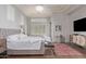 Relaxing bedroom featuring a luxurious bed, stylish furnishings, and lots of natural light at 10534 N 133Rd St, Scottsdale, AZ 85259
