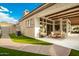 Beautiful covered patio with wood beam details and outdoor dining area at 10534 N 133Rd St, Scottsdale, AZ 85259