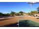 Community basketball court featuring well-maintained surface, hoops, and scenic mountain views at 10572 E Tierra Buena Ln, Scottsdale, AZ 85255
