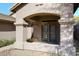 Inviting covered patio featuring a small table and chairs for relaxing outdoors at 10572 E Tierra Buena Ln, Scottsdale, AZ 85255