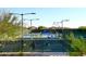 Community pickleball courts with nets, fencing, and lighting for day and night play at 10572 E Tierra Buena Ln, Scottsdale, AZ 85255