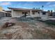 Private backyard with covered patio, brick accents, and space for entertaining at 11020 N 45Th Ave, Glendale, AZ 85304