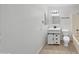 Bright bathroom with a shower over tub, modern vanity and sliding door, and tile floors at 11020 N 45Th Ave, Glendale, AZ 85304
