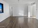 Spacious bedroom featuring light colored walls and wood-look flooring at 11020 N 45Th Ave, Glendale, AZ 85304