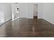 Bright bedroom with wood-look floors and neutral walls at 11020 N 45Th Ave, Glendale, AZ 85304