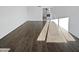 Bright living room featuring hardwood floors, creating a modern and inviting living space at 11020 N 45Th Ave, Glendale, AZ 85304