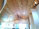 Vaulted ceiling featuring wooden panels, recessed lighting, and a ceiling fan over an open living space at 1127 N Sherwood Way, Queen Valley, AZ 85118