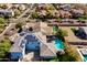 Aerial view of home with backyard pool, solar panels, and well-maintained neighborhood at 12956 N 152Nd Ave, Surprise, AZ 85379