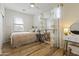 Bedroom featuring a ceiling fan and a bed and end tables at 12956 N 152Nd Ave, Surprise, AZ 85379