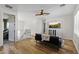 Upstairs living room with a fan, television, and modern furniture at 12956 N 152Nd Ave, Surprise, AZ 85379
