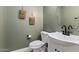 Stylish powder room with modern fixtures and elegant decor for added convenience at 12956 N 152Nd Ave, Surprise, AZ 85379