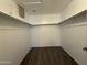 The well-lit walk-in closet features ample storage space and shelving for organization at 1304 S Owl Dr, Gilbert, AZ 85296