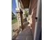 Inviting front porch with stone pillars and a view of the well-maintained community at 1304 S Owl Dr, Gilbert, AZ 85296