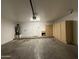 The garage offers ample space, natural wood cabinets for storage, and convenient access to the home's interior at 1304 S Owl Dr, Gilbert, AZ 85296
