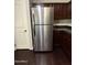 Stainless steel refrigerator with matching cabinetry offers a clean and modern kitchen aesthetic at 1304 S Owl Dr, Gilbert, AZ 85296