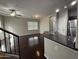Open-concept living area with hardwood floors connects to the kitchen and dining space at 1304 S Owl Dr, Gilbert, AZ 85296