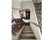 This staircase gives you a view of the stainless steel kitchen and modern living room at 1304 S Owl Dr, Gilbert, AZ 85296