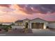 Charming single-Gathering home with well-manicured landscaping, desert rock, and a two-car garage at 13616 W Junipero Dr, Sun City West, AZ 85375