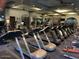 Rows of treadmills and other workout equipment inside the community gym at 13616 W Junipero Dr, Sun City West, AZ 85375