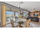 Open-concept living area boasts a dining area and easy access to the backyard pool at 13616 W Junipero Dr, Sun City West, AZ 85375