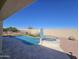 Beautiful backyard boasts a private pool, spa, ample patio space, and desert landscaping for relaxation and enjoyment at 13616 W Junipero Dr, Sun City West, AZ 85375