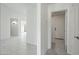A clean hallway with multiple doorways offering access to other rooms at 14398 W Marcus Dr, Surprise, AZ 85374