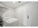 This laundry room features a washer and dryer and ample space at 14398 W Marcus Dr, Surprise, AZ 85374