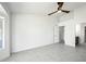This spacious main bedroom features neutral colors and access to an ensuite bathroom at 14398 W Marcus Dr, Surprise, AZ 85374