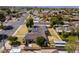 Aerial view of a single-story home with a well-kept backyard, featuring a roof equipped with solar panels at 1610 E Mclellan Rd, Mesa, AZ 85203