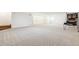 Finished basement with neutral carpet, a window and multiple closets for storage at 1610 E Mclellan Rd, Mesa, AZ 85203