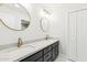 Luxurious bathroom showcasing double vanity with quartz counters and modern fixtures at 1610 E Mclellan Rd, Mesa, AZ 85203