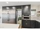 Close up of kitchen cabinets and stainless steel fridge at 1610 E Mclellan Rd, Mesa, AZ 85203