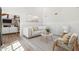 Cozy living room featuring neutral decor, stylish furnishings, a decorative rug, and ample natural light at 1610 E Mclellan Rd, Mesa, AZ 85203