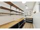 Pantry features wooden shelves at 1610 E Mclellan Rd, Mesa, AZ 85203