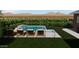A sparkling pool with lounge chairs offer a relaxing outdoor oasis for leisure and entertainment at 1610 E Mclellan Rd, Mesa, AZ 85203