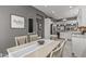 Dining area with modern decor flowing seamlessly into the kitchen at 16232 W Montoya Dr, Surprise, AZ 85374