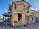 Construction image shows the side view of a house, exterior sheathing, and window placements at 1905 W Lariat Ln, Phoenix, AZ 85085