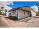 Charming home exterior featuring a covered carport and well-manicured landscaping at 2650 W Union Hills Dr # 271, Phoenix, AZ 85027