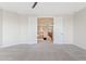 Large bedroom featuring doors leading to hallway at 2670 E Parkview Dr, Gilbert, AZ 85295