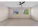 Large bedroom featuring two windows with beautiful outdoor views at 2670 E Parkview Dr, Gilbert, AZ 85295