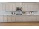 Chef's kitchen featuring a gas cooktop, stainless steel appliances, quartz countertops, and ample cabinetry at 2670 E Parkview Dr, Gilbert, AZ 85295