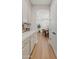 Butlers pantry with quartz countertops, stainless steel appliances, and an archway leading to the dining room at 2670 E Parkview Dr, Gilbert, AZ 85295