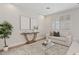 Inviting living room showcasing a stylish console table, soft natural light, and modern decor accents at 2670 E Parkview Dr, Gilbert, AZ 85295