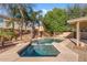 Inviting pool featuring a spa and lush landscaping, perfect for relaxation and outdoor enjoyment at 2670 E Parkview Dr, Gilbert, AZ 85295