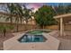 Backyard pool with separate spa featuring mature landscaping and paved patio at 2670 E Parkview Dr, Gilbert, AZ 85295