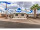 Charming single-story home with a carport and well-maintained landscaping including many palm trees at 2700 E Allred Ave # A3, Mesa, AZ 85204