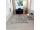 Cozy bonus room with piano, guitar, chess table, textured rug, and ample lighting at 29606 N Tarragona Dr, Peoria, AZ 85383