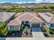 Charming single-story home with desert landscaping, neutral color scheme, and attached garage at 29606 N Tarragona Dr, Peoria, AZ 85383