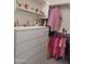 Spacious walk-in closet with built in storage and organization shelving at 29606 N Tarragona Dr, Peoria, AZ 85383