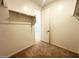 Walk-in closet with built-in shelving and plush carpeting at 32723 N Newby Dr, San Tan Valley, AZ 85140